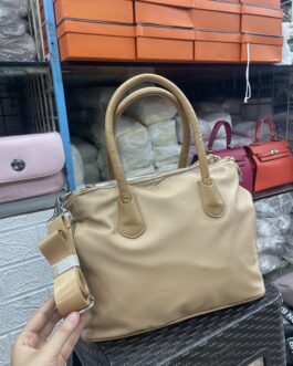 Zilpah Water Resistant Beige Handbag + BroadStrap